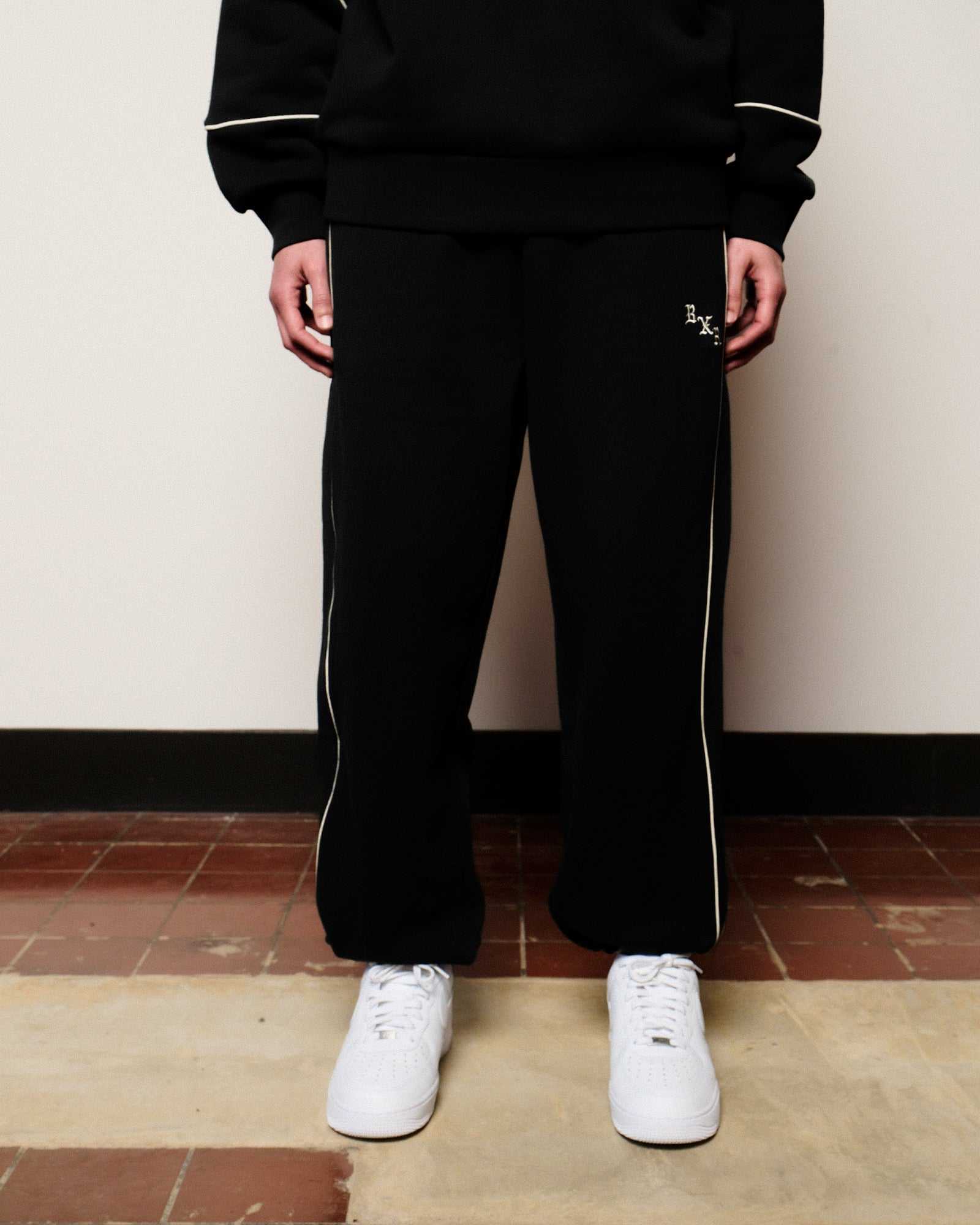 Born x Raised BXR Piped Sweatpants Black Sweat & Track Pants B2004PIPED-BLK On Model Front View | Overkill
